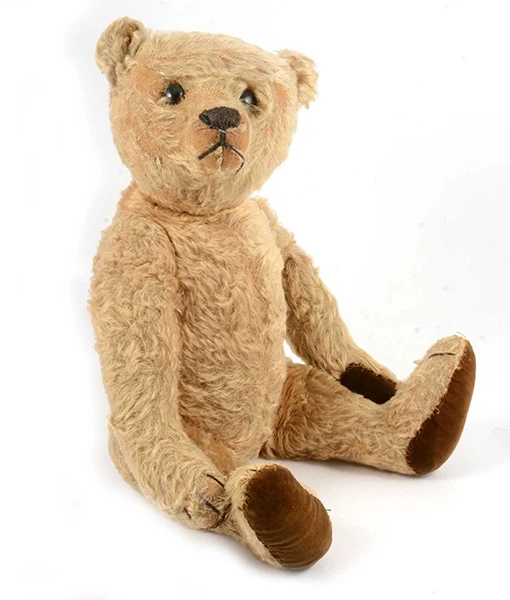 Image direction: a real repair or conservation process showing restrained support of weak mohair, pad repair, careful seam work or archival support. Avoid an exaggerated makeover image unless used explicitly to contrast reconstruction with conservation.