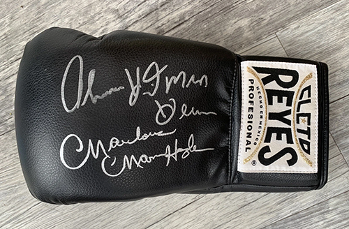 A boxing glove signed by Marvin Hagler and Thomas Hearns.
